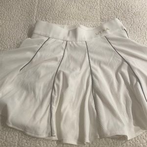New small white UTAA Korean brand golf skirt w shorts underneath.